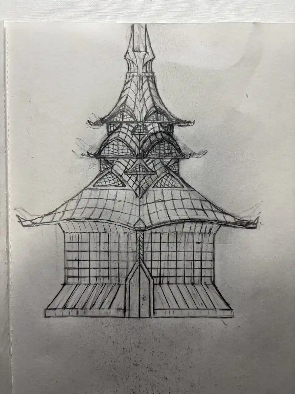 A pencil sketch on textured paper depicts a multi-tiered pagoda with a highly stylized, symmetrical design. The rooflines…