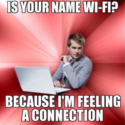 A man in a gray suit sits at a laptop against a red radial background, looking surprised. The text reads 'IS YOUR NAME…