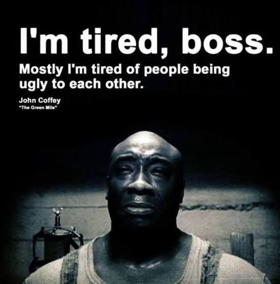 A black-and-white image of John Coffey from 'The Green Mile' looking weary and sad, with white text overlaid that reads…