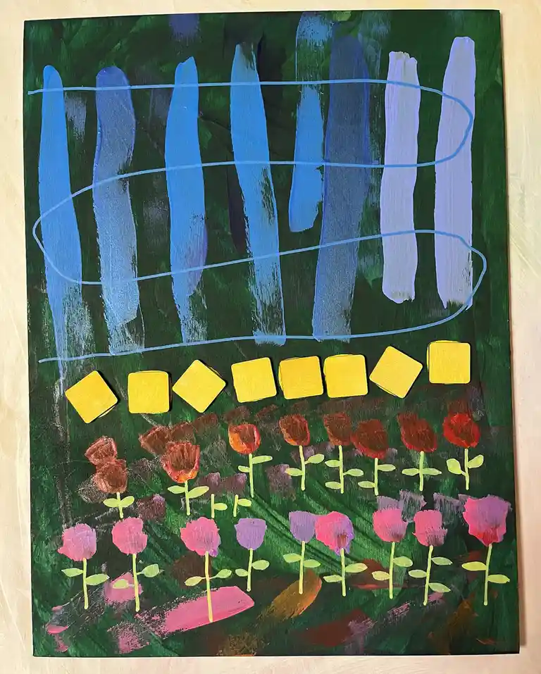A child's painting depicts a garden scene with rows of colorful flowers and yellow squares above them, all enclosed by a…