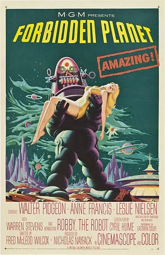 A vintage MGM movie poster for 'Forbidden Planet' shows a giant, menacing robot holding a blonde woman in a dramatic pose…