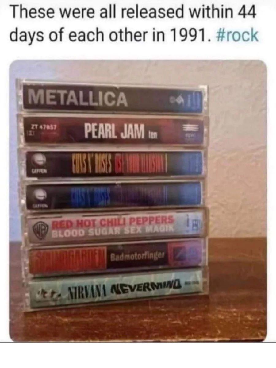 A stack of seven cassette tapes from 1991, featuring Metallica, Pearl Jam, Guns N' Roses, Red Hot Chili Peppers…