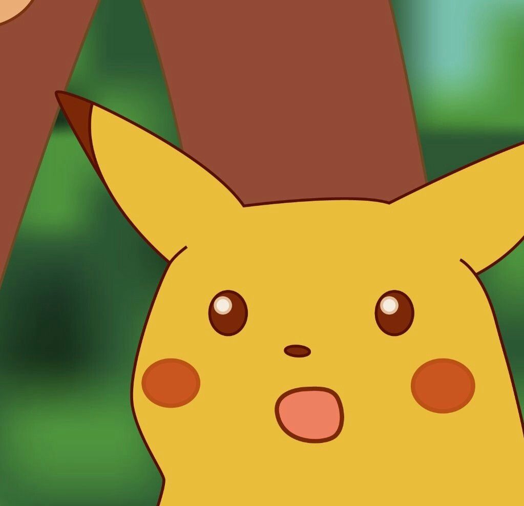A close-up of the cartoon character Pikachu with a surprised expression, mouth open and eyes wide, set against a blurred…