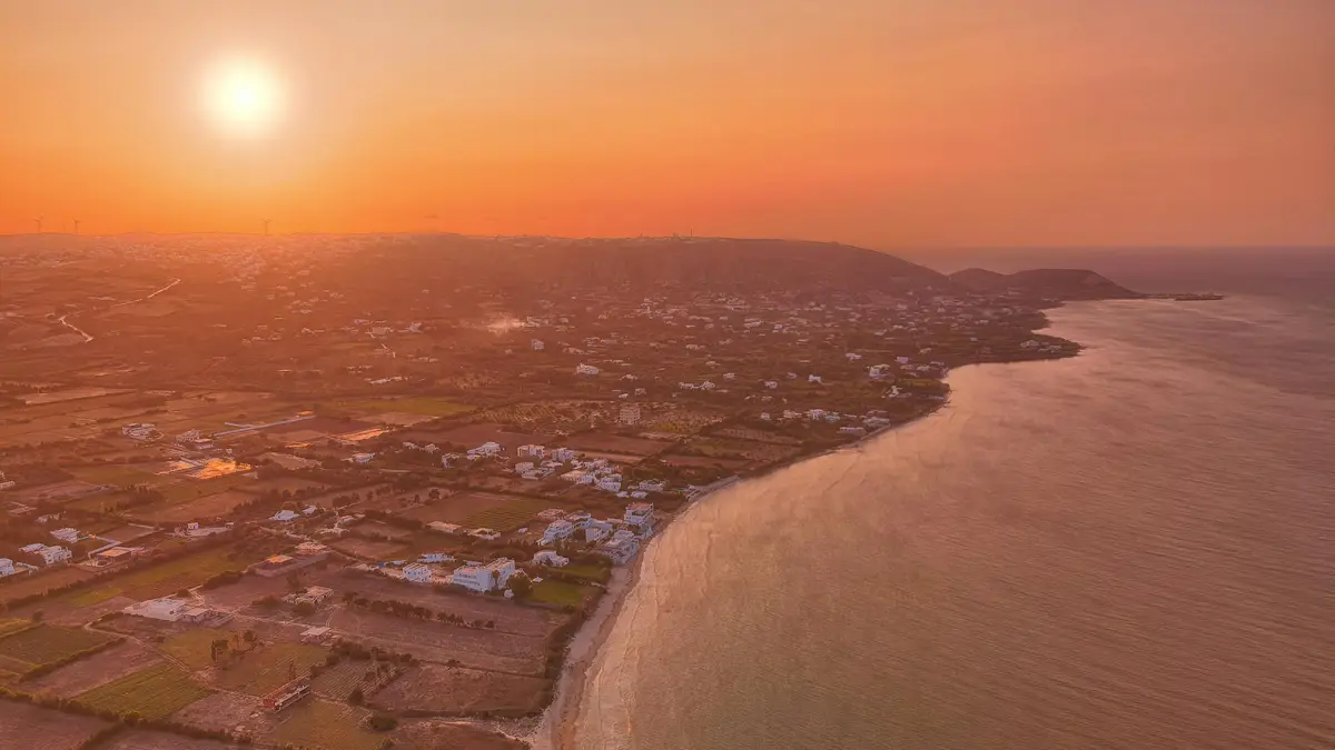 Golden hues dance across the sky as the sun dips into the Mediterranean, casting a warm glow on the Ras Jebel coastline's…