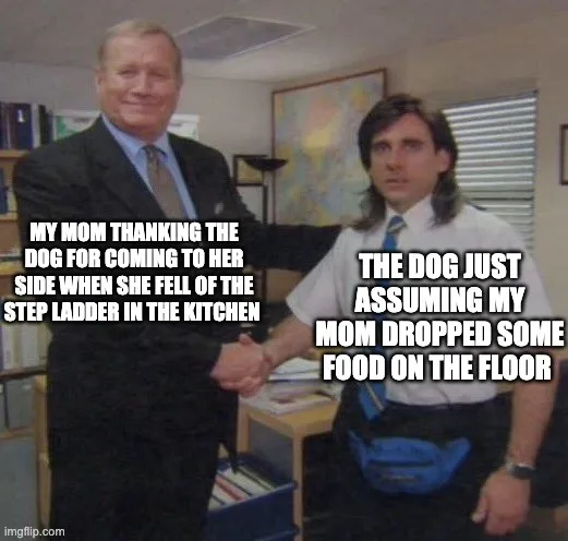 Two men in business attire shake hands in an office setting. The man on the left, smiling, has text overlaid saying 'MY MOM…
