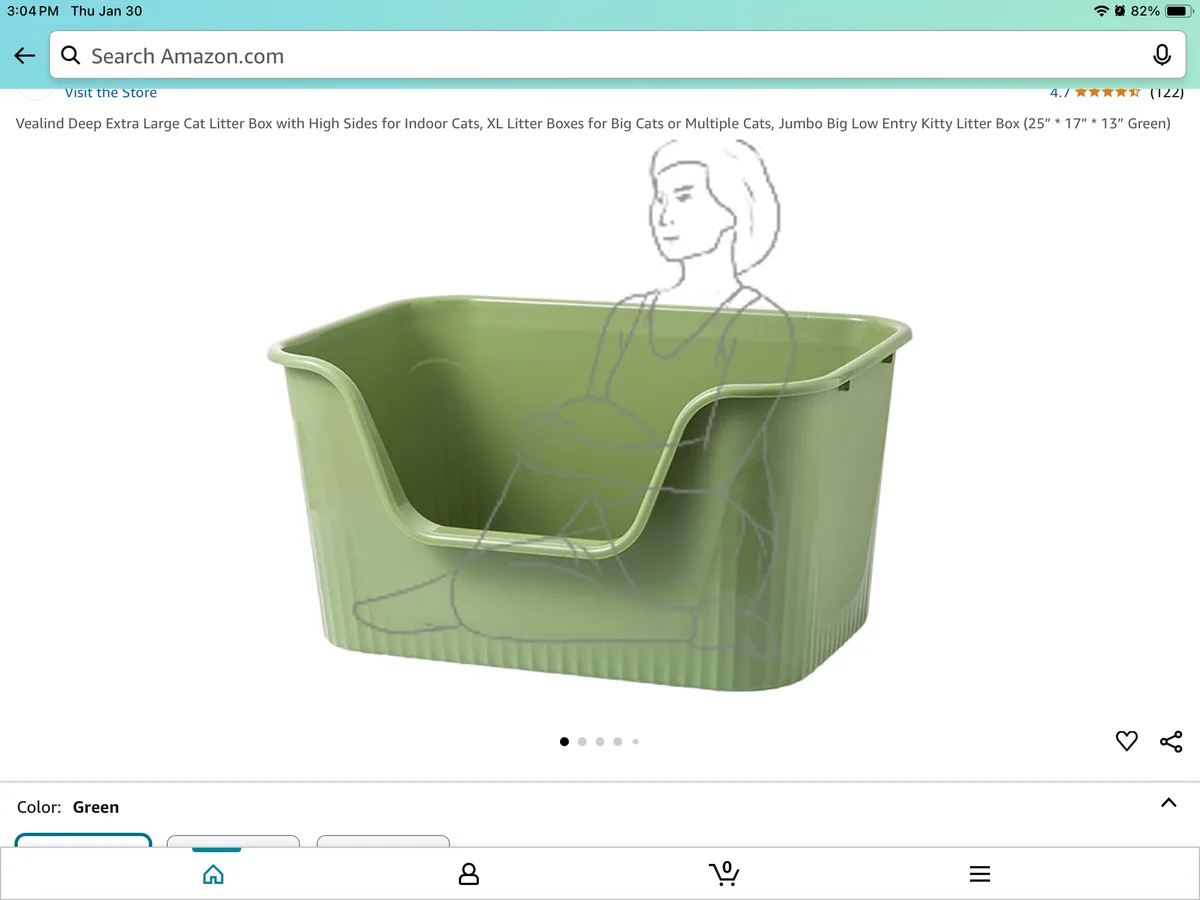 An amazon product page for a large green cat litter box shows a faint sketch of a person sitting inside it, humorously…