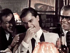 A six-panel sequence from the movie 'The Godfather' shows a man in a white suit progressively reacting with increasing shock…