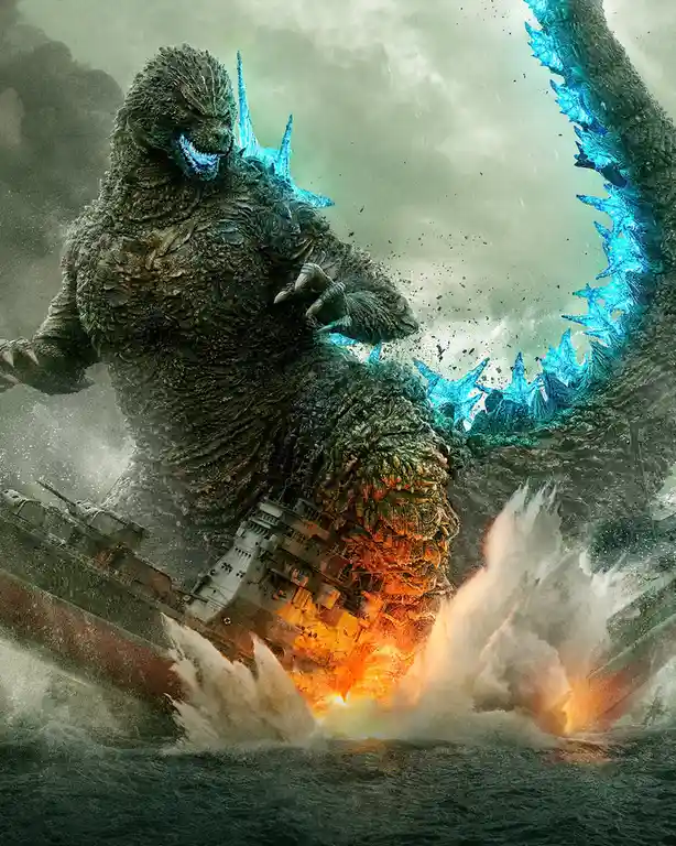 A colossal Godzilla with glowing blue energy spikes along his back and spine is standing in the ocean, crushing a large…