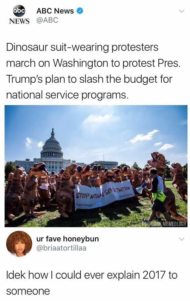 A screenshot of a tweet from ABC News showing protesters in full dinosaur costumes marching in front of the U.S. Capitol…