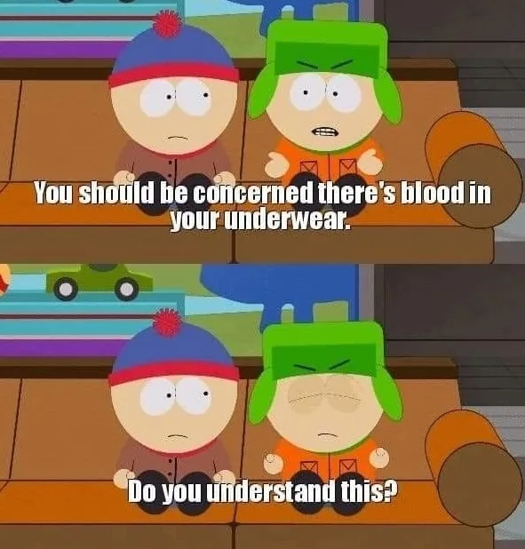 Two cartoon boys, one in a blue hat and one in a green hat, sit on a couch. The boy in the green hat says, 'You should be…