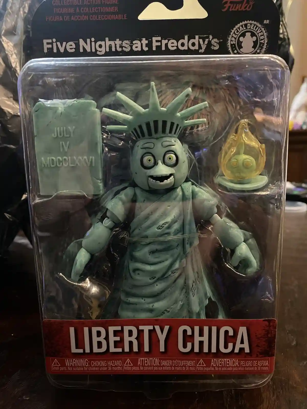 A Funko Five Nights at Freddy's collectible action figure of Liberty Chica, a zombie-like Statue of Liberty character, is…