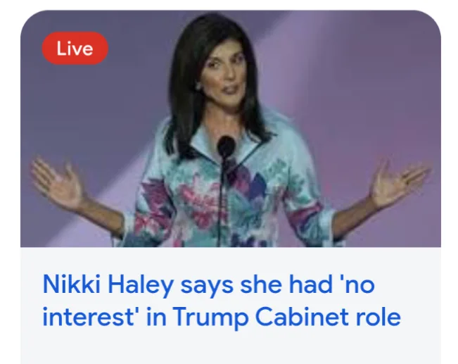 A screenshot of a live news broadcast shows Nikki Haley speaking at a podium with her hands open in a gesture of explanation…