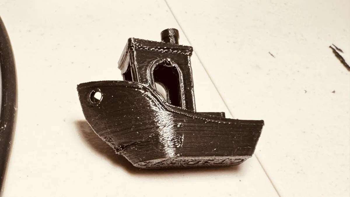Check out my latest 3D print! Any advice for improvement? I think my old filament might be causing some issues.