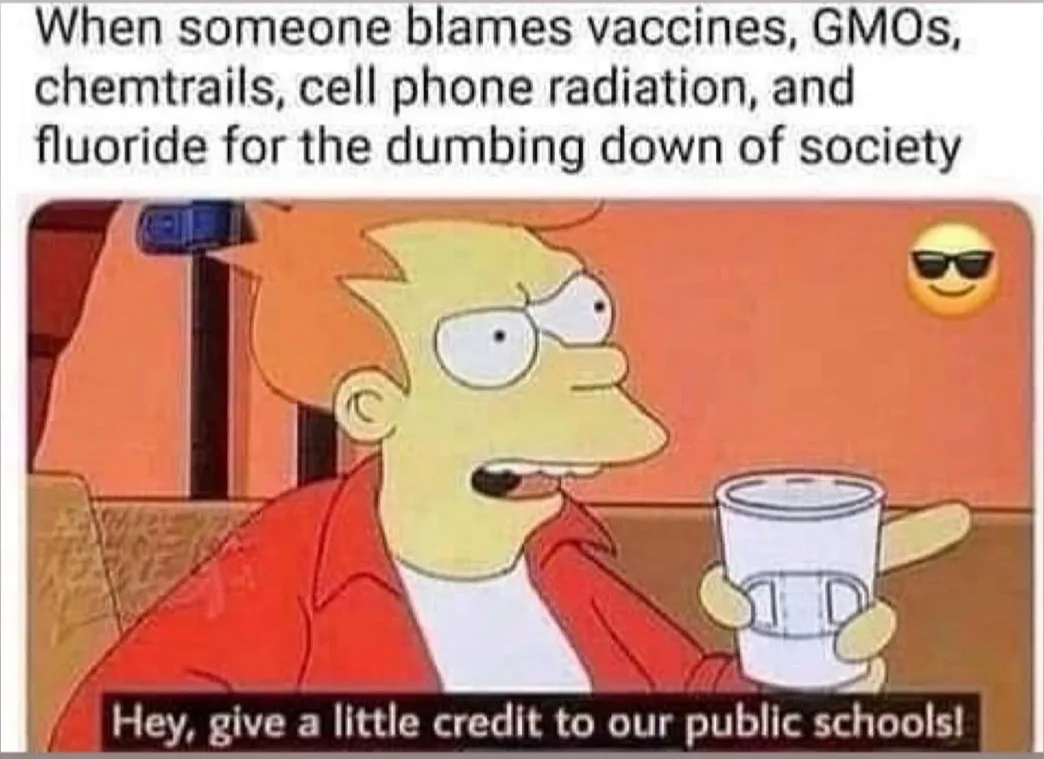 The image shows the animated character Fry from The Simpsons, holding a plastic cup and looking smugly to the side while…