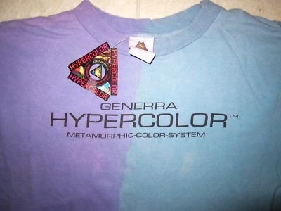A close-up of a t-shirt with a visible color gradient from purple to blue, showing the brand name 'GENERRA HYPERCOLOR™' and…
