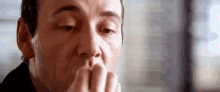A six-panel sequence shows a man in a dark shirt reacting to something shocking: first covering his nose, then recoiling…
