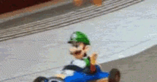 A split-screen image shows Luigi in a blue go-kart racing, then transitioning to him looking annoyed and pointing his…