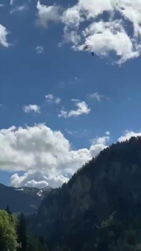 A sequence of images shows a person kitesurfing on a lake, then running across a grassy field with a kite, and finally…