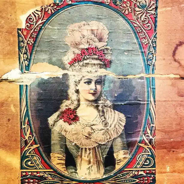 A torn, vintage-style portrait of a woman in an ornate, frilly 18th-century dress with a large powdered wig adorned with red…