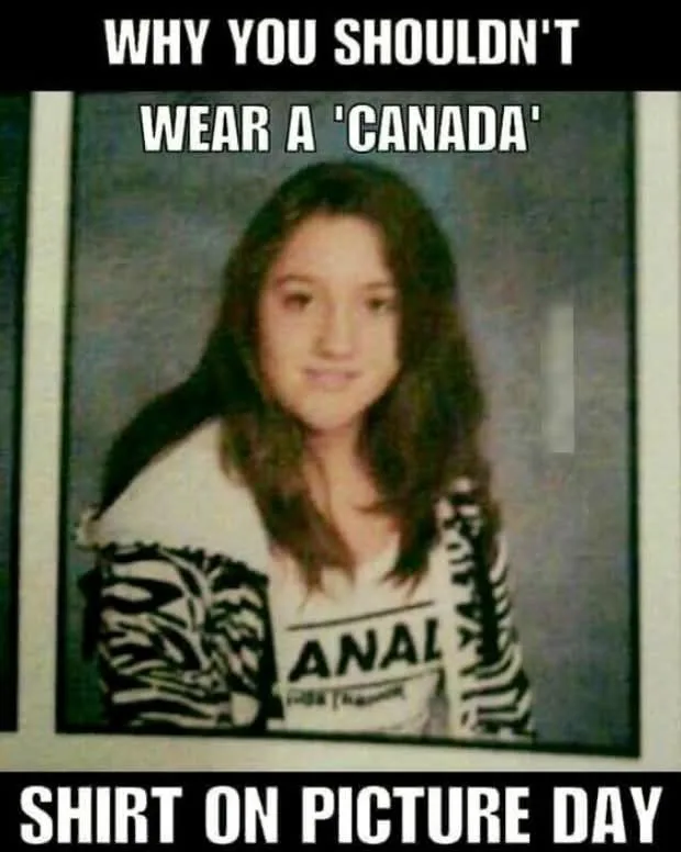 A blurry school picture of a young girl wearing a white t-shirt with a black zebra-print pattern and the word 'ANAL' visible…