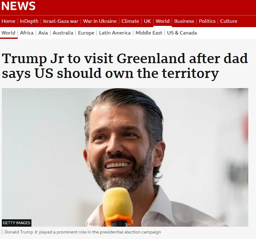 A screenshot of a news article header showing Donald Trump Jr. smiling while speaking into a microphone. The headline reads…