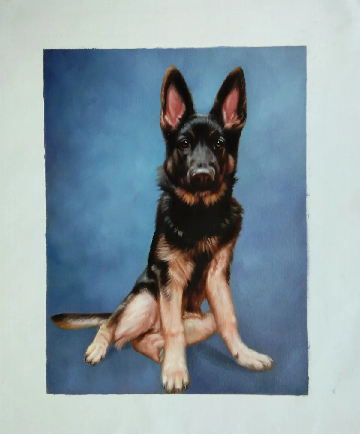 A realistic painting of a black and tan German Shepherd puppy sitting upright on a blue background, its front paws together…