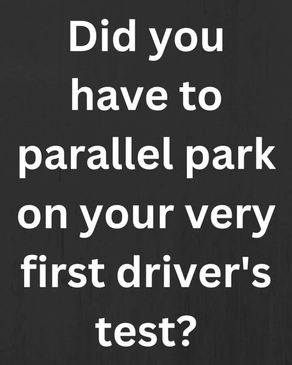 The image displays white text on a dark, wood-grain background. The text asks, 'Did you have to parallel park on your very…