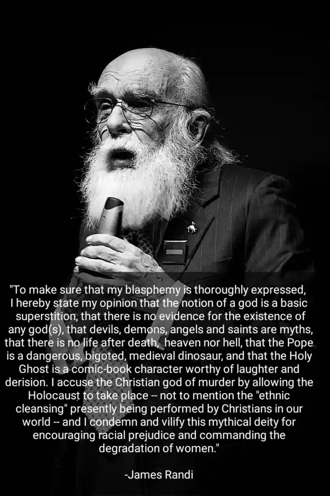 A black-and-white photograph of James Randi, an elderly man with a long white beard and glasses, speaking into a microphone…