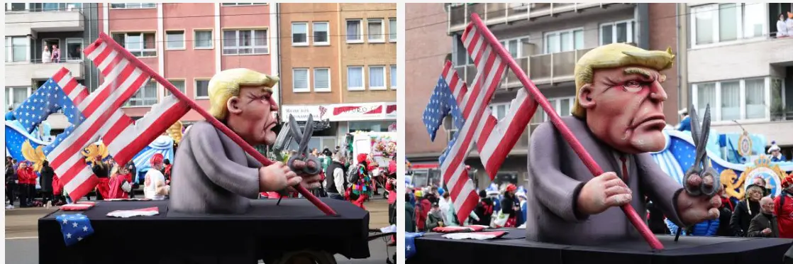 A parade float features a large caricature of Donald Trump holding scissors and cutting an American flag. The float is…