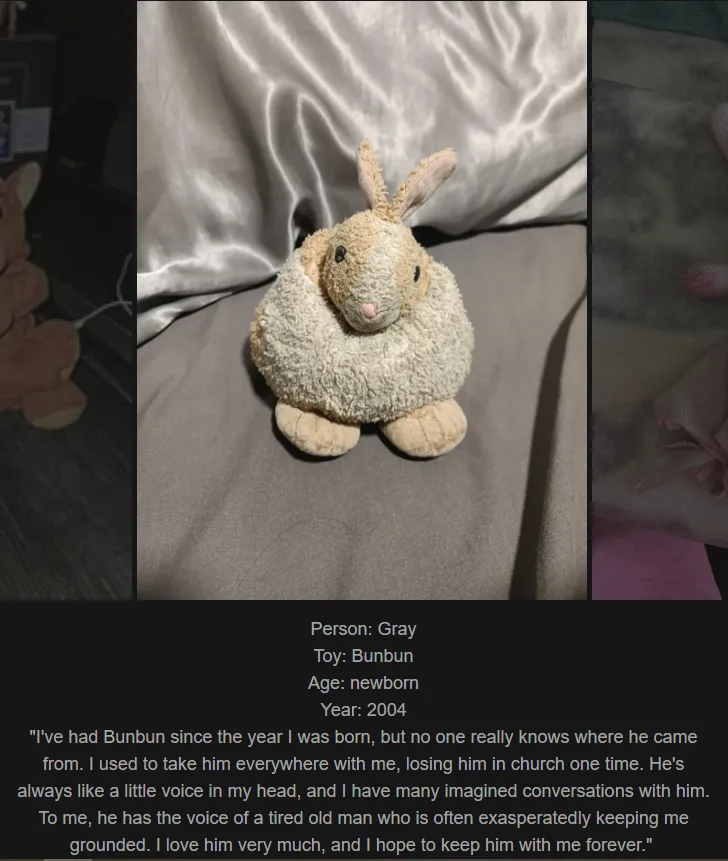 A close-up photo of a worn, beige stuffed rabbit toy named Bunbun, sitting on a gray fabric surface with a satin-like sheet…