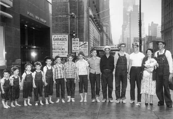 Meet Mr. and Mrs. Emory Harrison from Jonesborough, Tennessee, proud parents of 13 boys, creating the largest all-male American family in 1955.