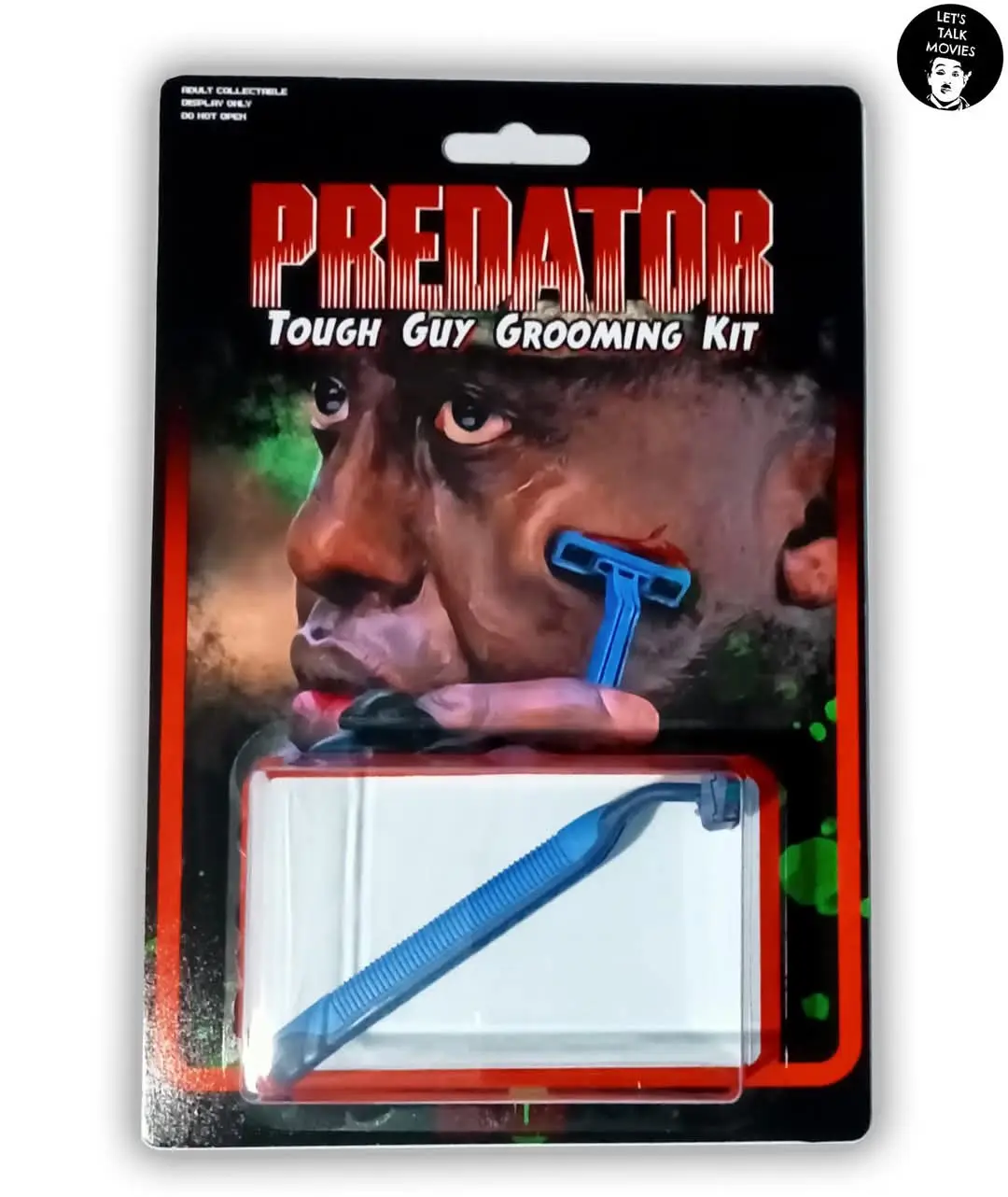 A product package parodying the 'Predator' movie, featuring a close-up of a man's face with a blue razor blade stuck to his…