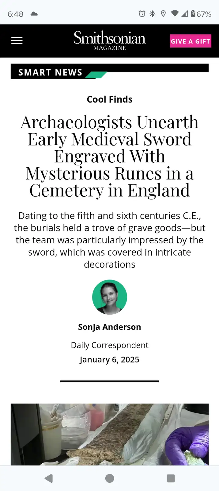 A screenshot of a Smithsonian Magazine article titled 'Archaeologists Unearth Early Medieval Sword Engraved With Mysterious…