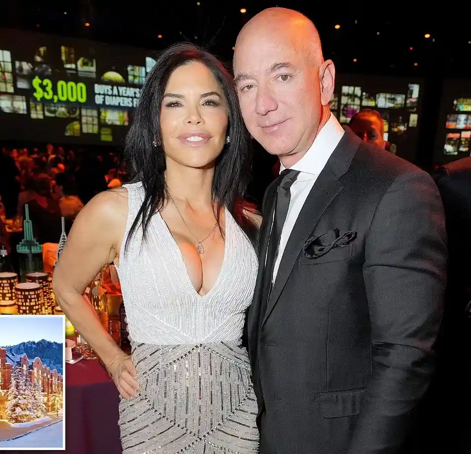 A man and woman pose together at a formal event, with a large screen behind them displaying '$3,000 BUYS A YEAR'S OF DIAPERS…
