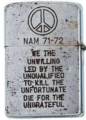 A weathered, silver-colored Zippo lighter with a peace symbol engraved at the top. Below it, the text 'NAM 71-72' is…