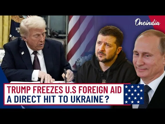 The image shows three men: Donald Trump on the left in a suit, Volodymyr Zelenskyy in the center wearing a black hoodie, and…
