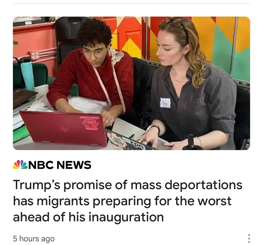 Two people sit at a table, one using a red laptop and the other looking at papers, overlaid with an NBC News headline about…
