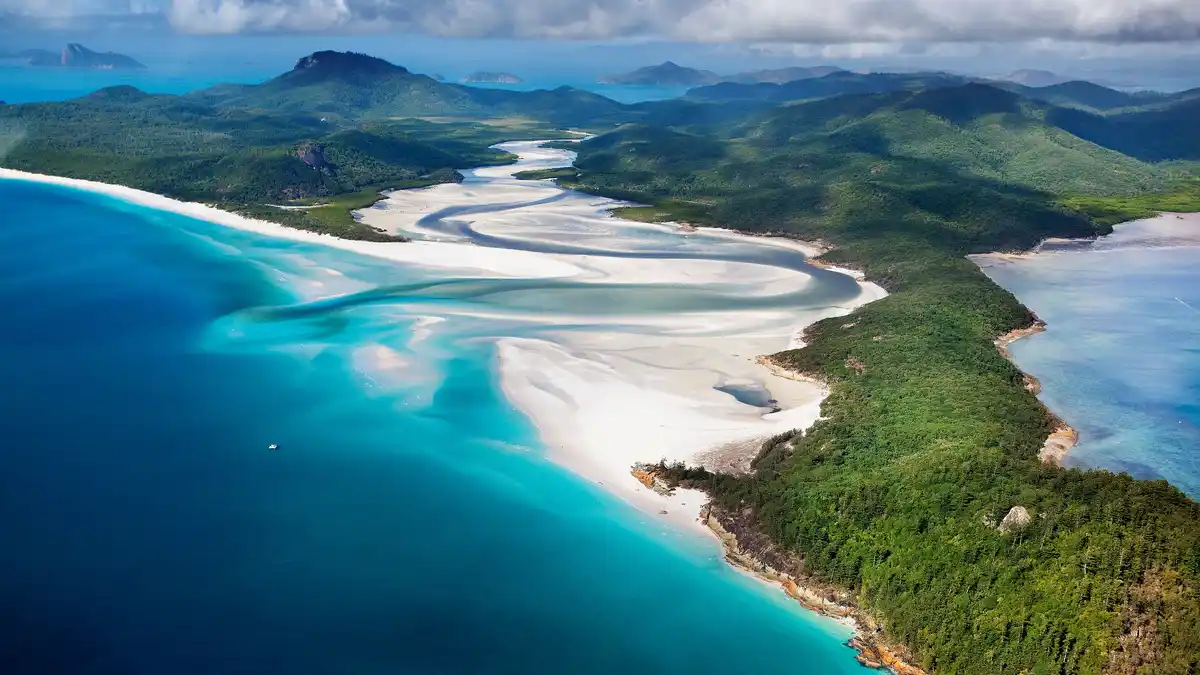 Whitehaven Beach's exceptionally fine, smooth sand is notorious for entering cameras and electronics. From afar, this…