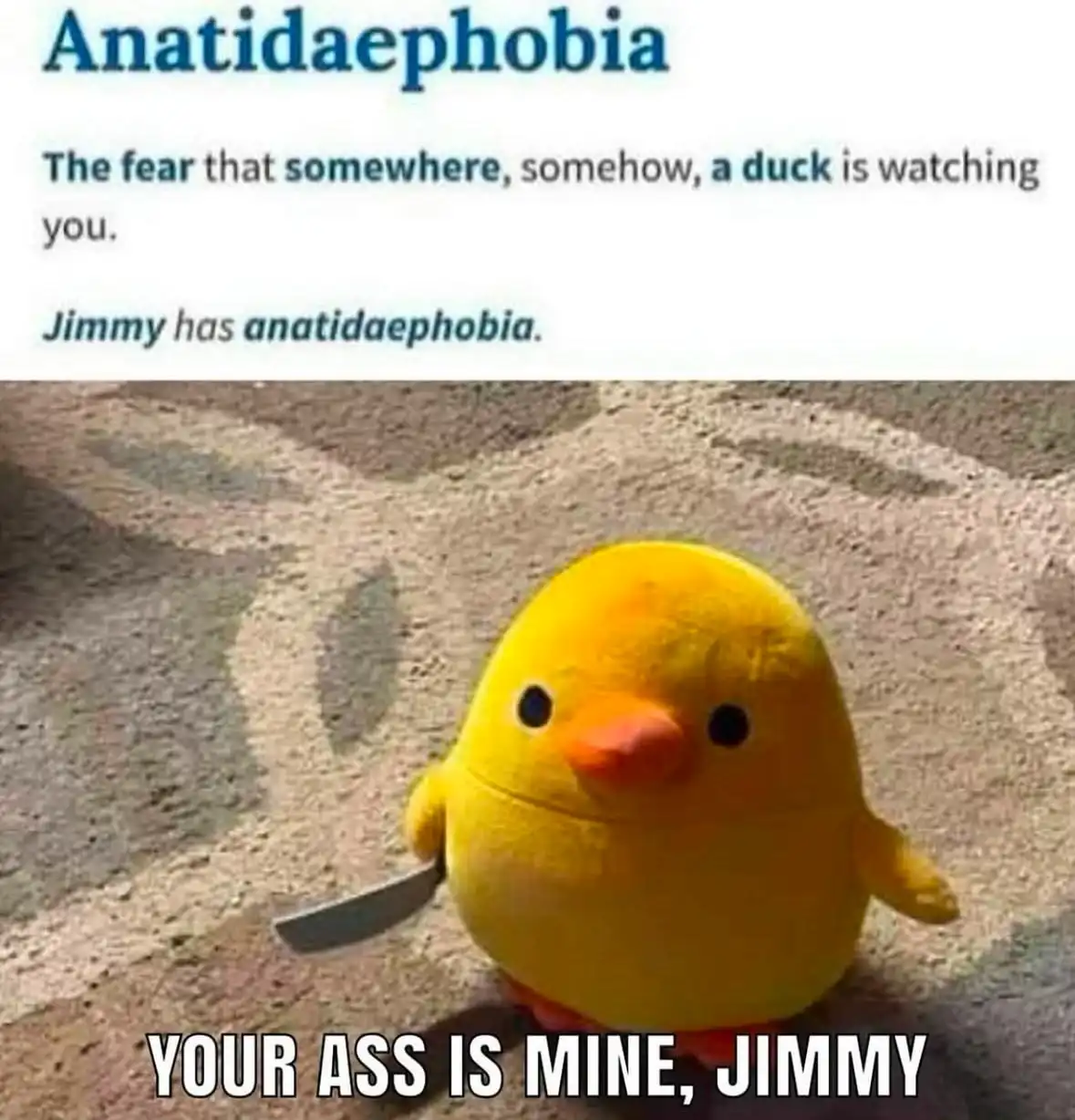 The image displays a plush yellow duck with a knife stuck in its side, sitting on a textured concrete surface. The top text…