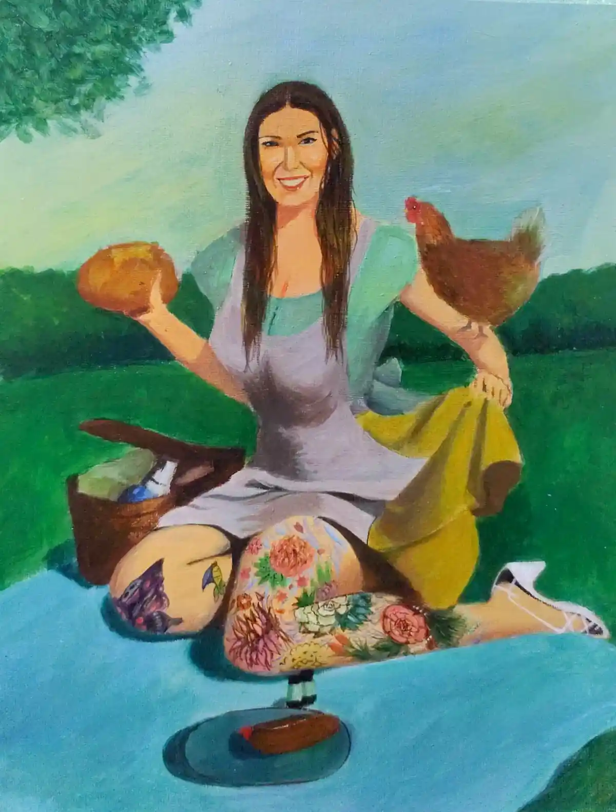 A painted image shows a smiling woman sitting outdoors on a blue blanket, holding a chicken in one arm and a loaf of bread…