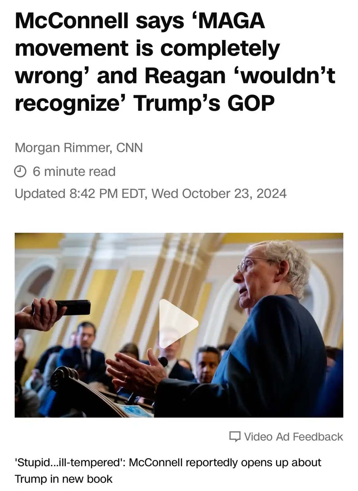 A screenshot of a CNN news article shows a photo of Senator Mitch McConnell speaking at a podium, with a play button…