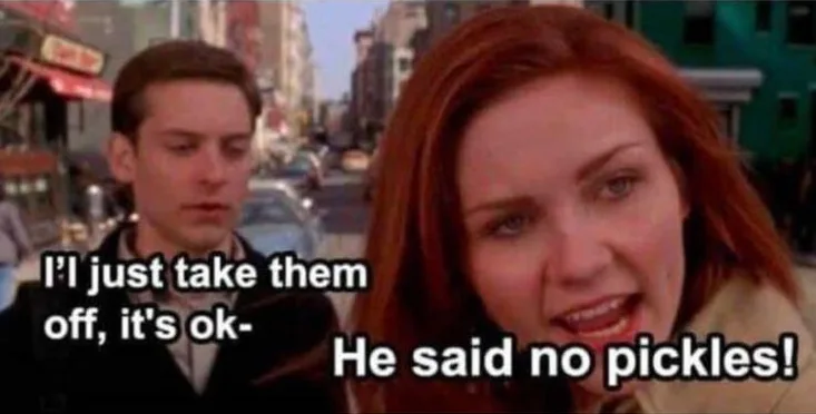 A still from the movie 'Friends' shows a man looking downcast while a woman with red hair shouts angrily. The man's text…
