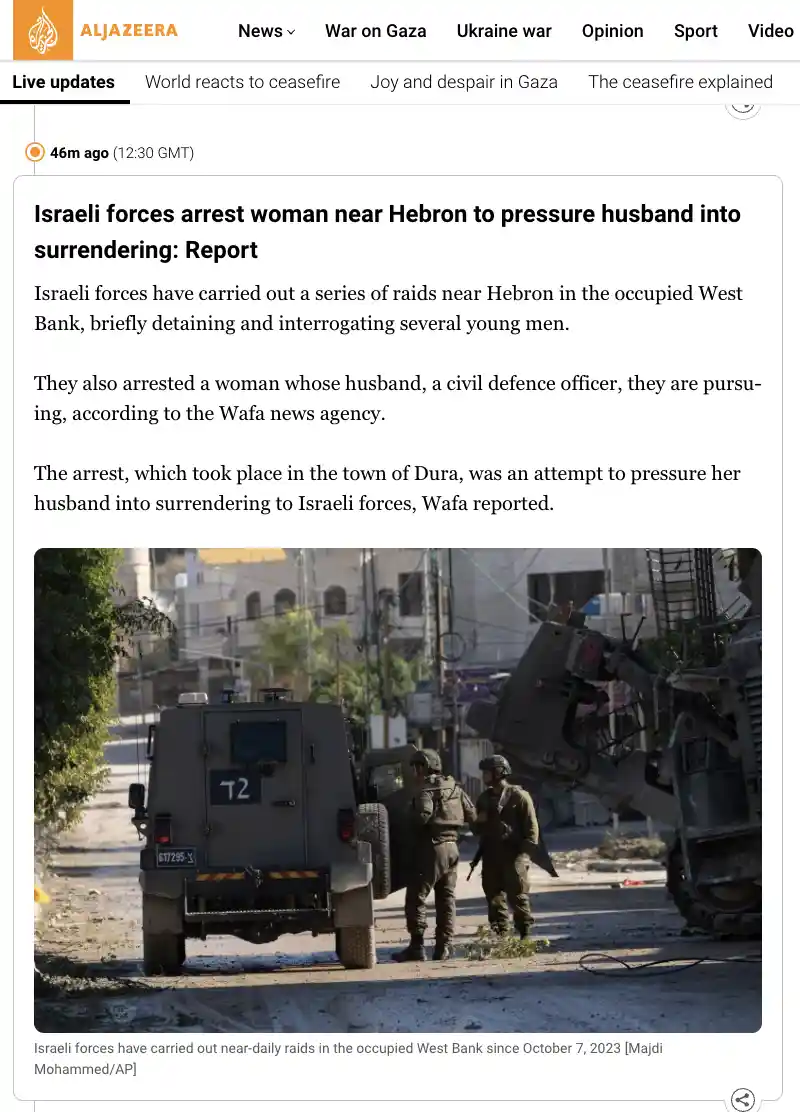 A screenshot of an Al Jazeera news article with a photo showing two soldiers in military gear standing near armored vehicles…