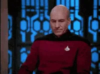 A six-frame sequence shows the character Spock from Star Trek, initially looking down, then smiling slightly, then covering…