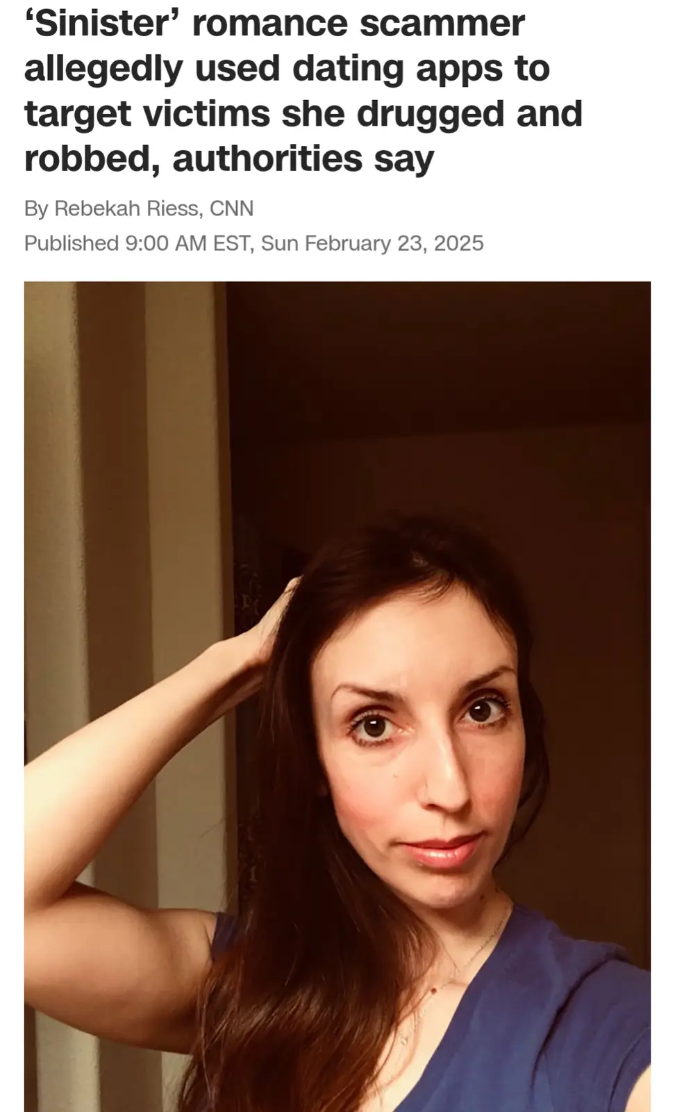 A screenshot of a CNN news article from February 23, 2025, featuring a photo of a woman with long brown hair, wearing a blue…