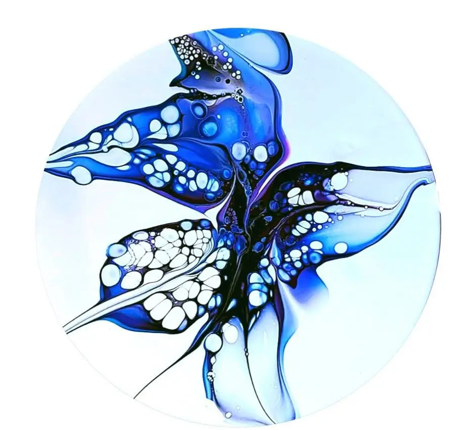 An abstract, circular artwork featuring a blue and black fluid design resembling a butterfly with white bubble-like patterns…