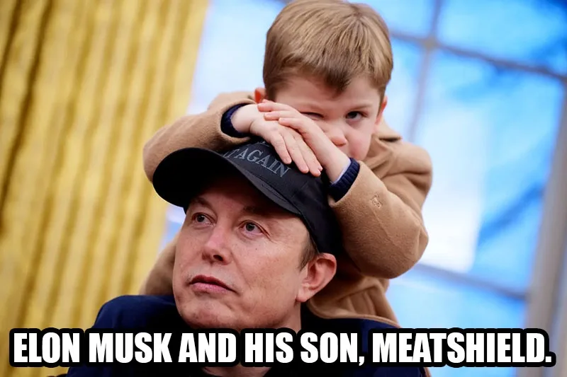 A man wearing a black cap with 'AGAIN' visible on it has a young boy perched on his shoulders. The boy, in a tan coat, rests…
