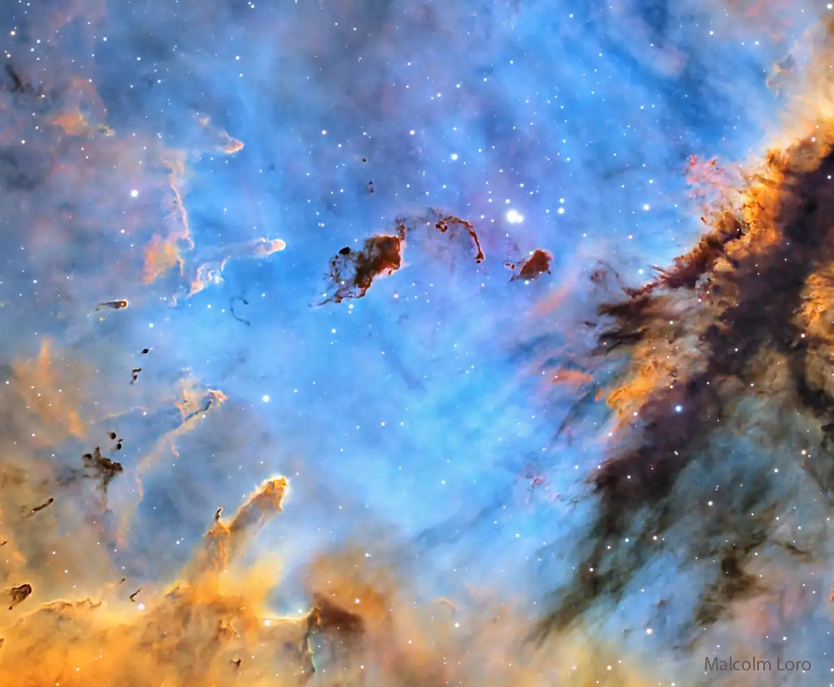 A vibrant space nebula image with swirling blue, orange, and black cosmic clouds and scattered stars, overlaid with the text…