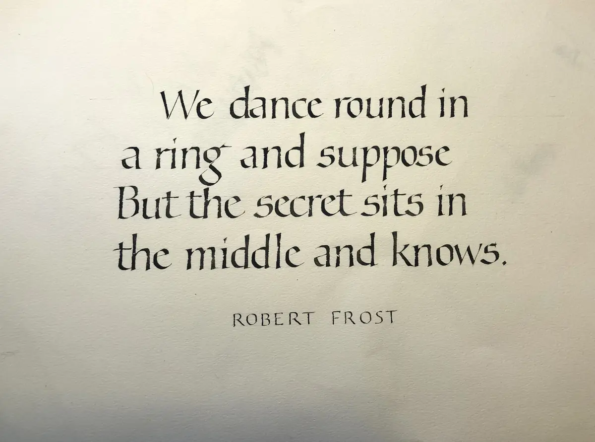 The image displays a handwritten-style quote on textured off-white paper. The text reads: 'We dance round in a ring and…