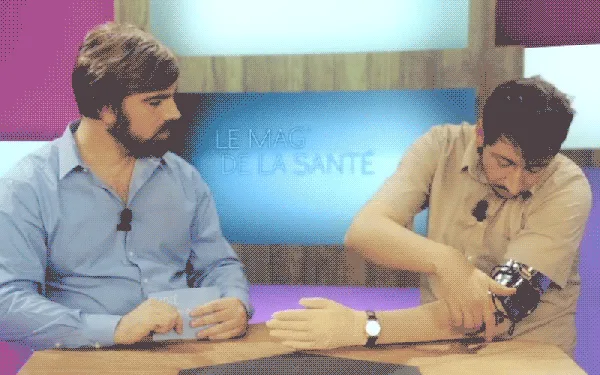 A six-panel image sequence from a French TV show 'Le Mag de la Santé' shows two men at a desk. The man on the right, wearing…